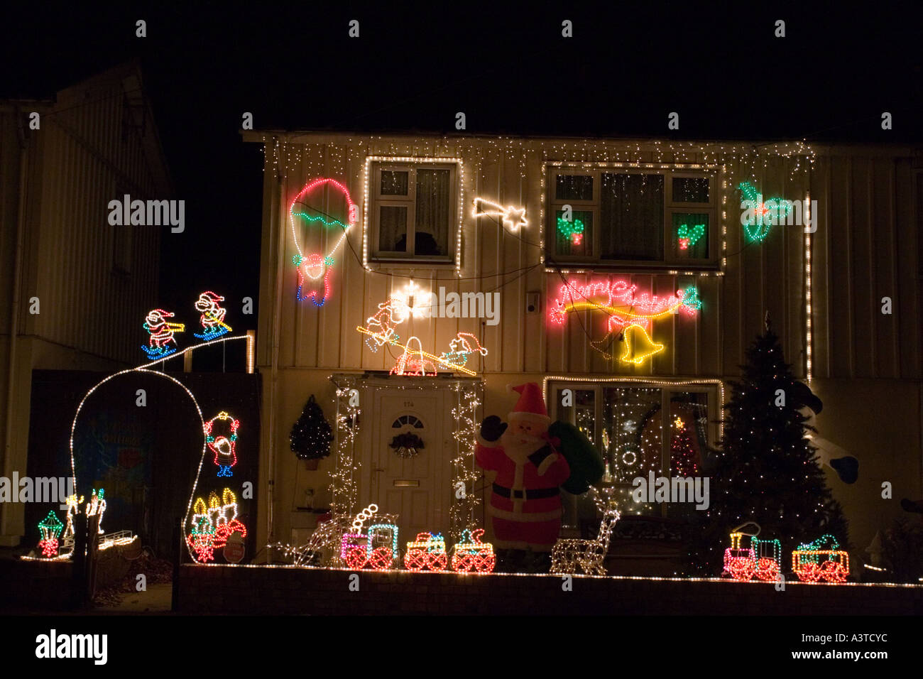 Christmas lights on front of prefabricated houses in Swindon, Wiltshire Stock Photo Alamy