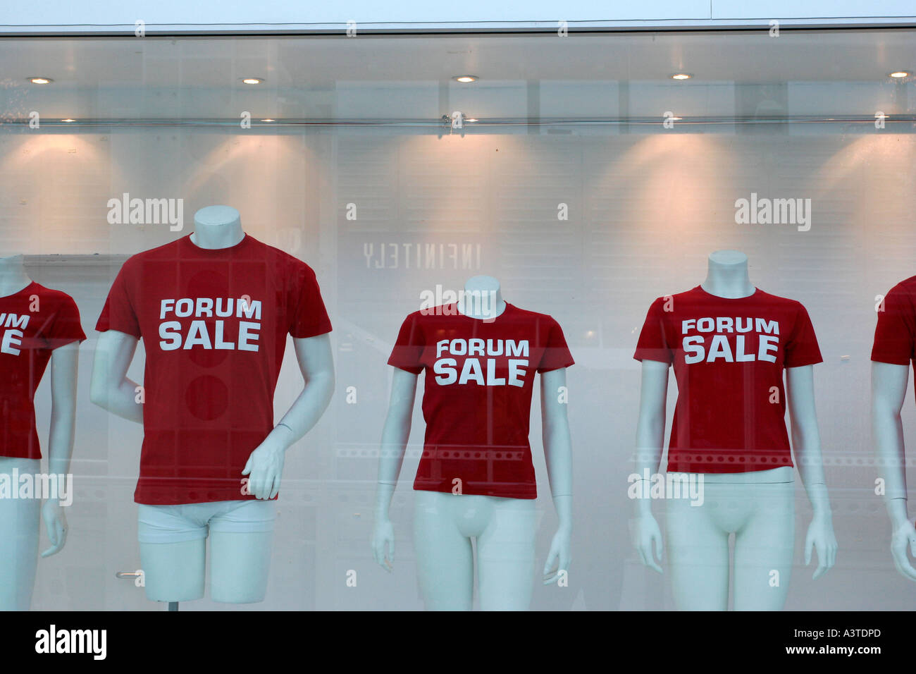 Shop windows with headless dummies advertising sale Stock Photo Alamy
