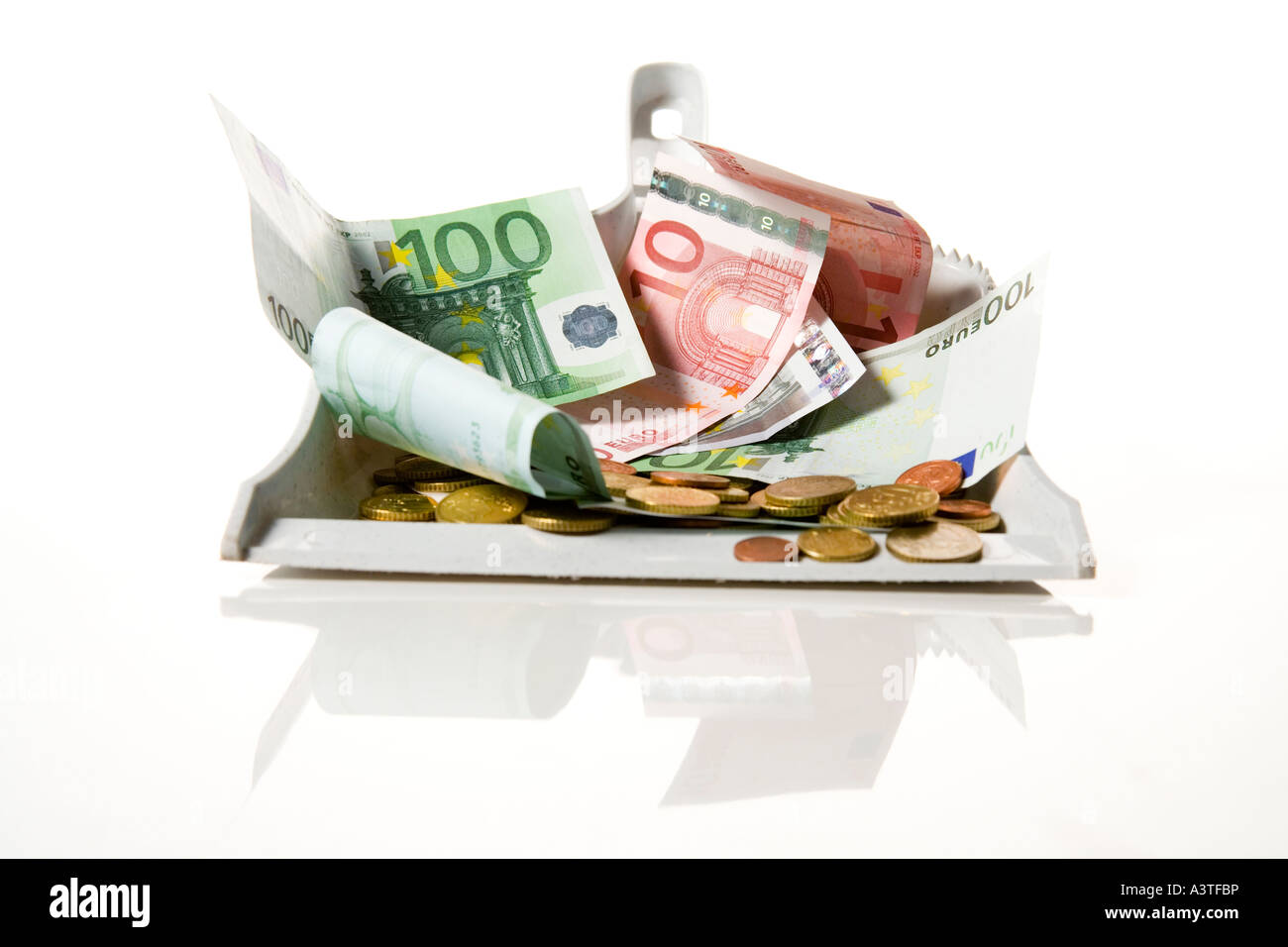 Money in a shovel Stock Photo Alamy