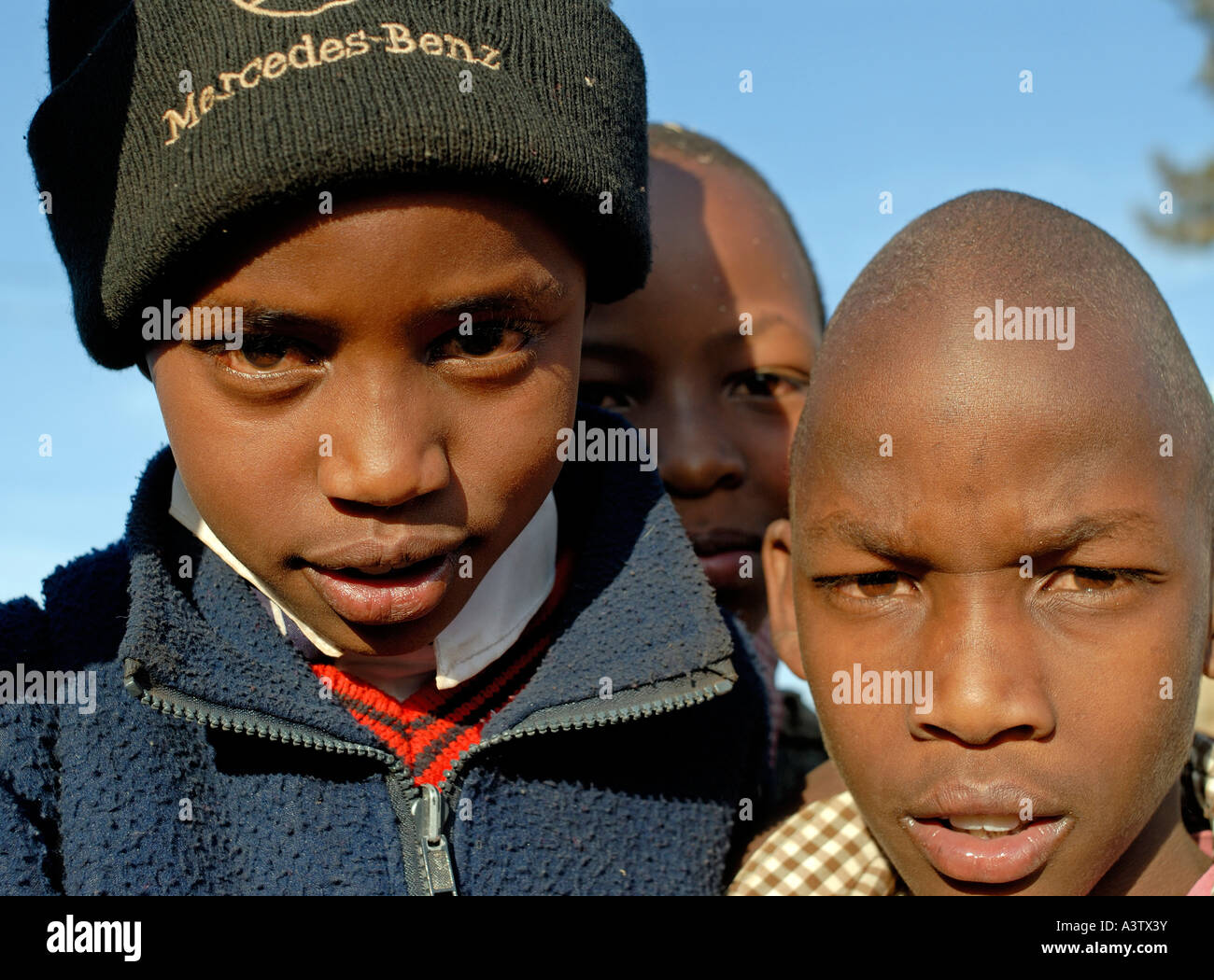 Kenyan boys with Mercedes Benz hat in Nyahururu Kenya Stock Photo Alamy