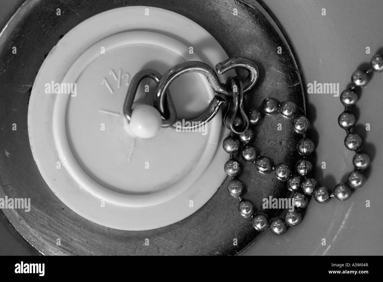 bathroom sink plug and chain Stock Photo Alamy