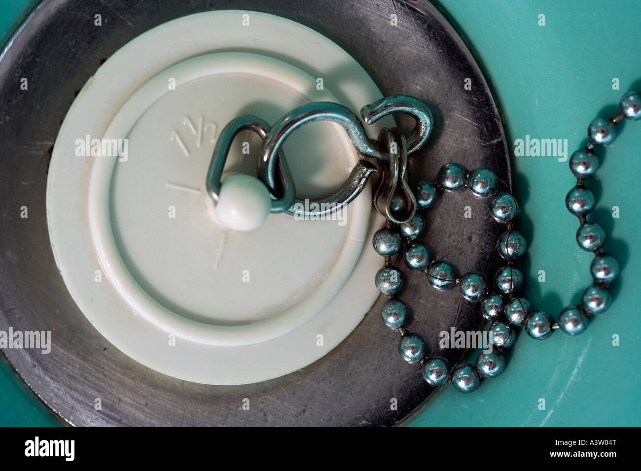bathroom sink plug and chain Stock Photo Alamy