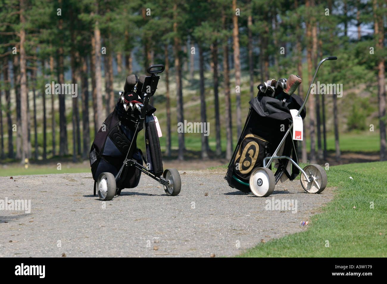 Bags of golf clubs Stock Photo