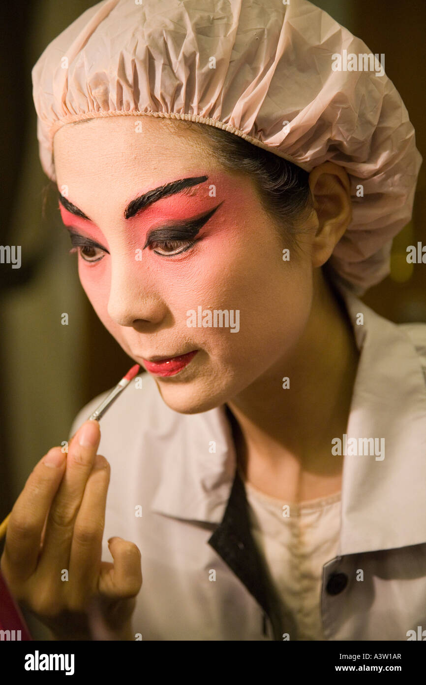 Peking Opera performer applying make up 16 Stock Photo
