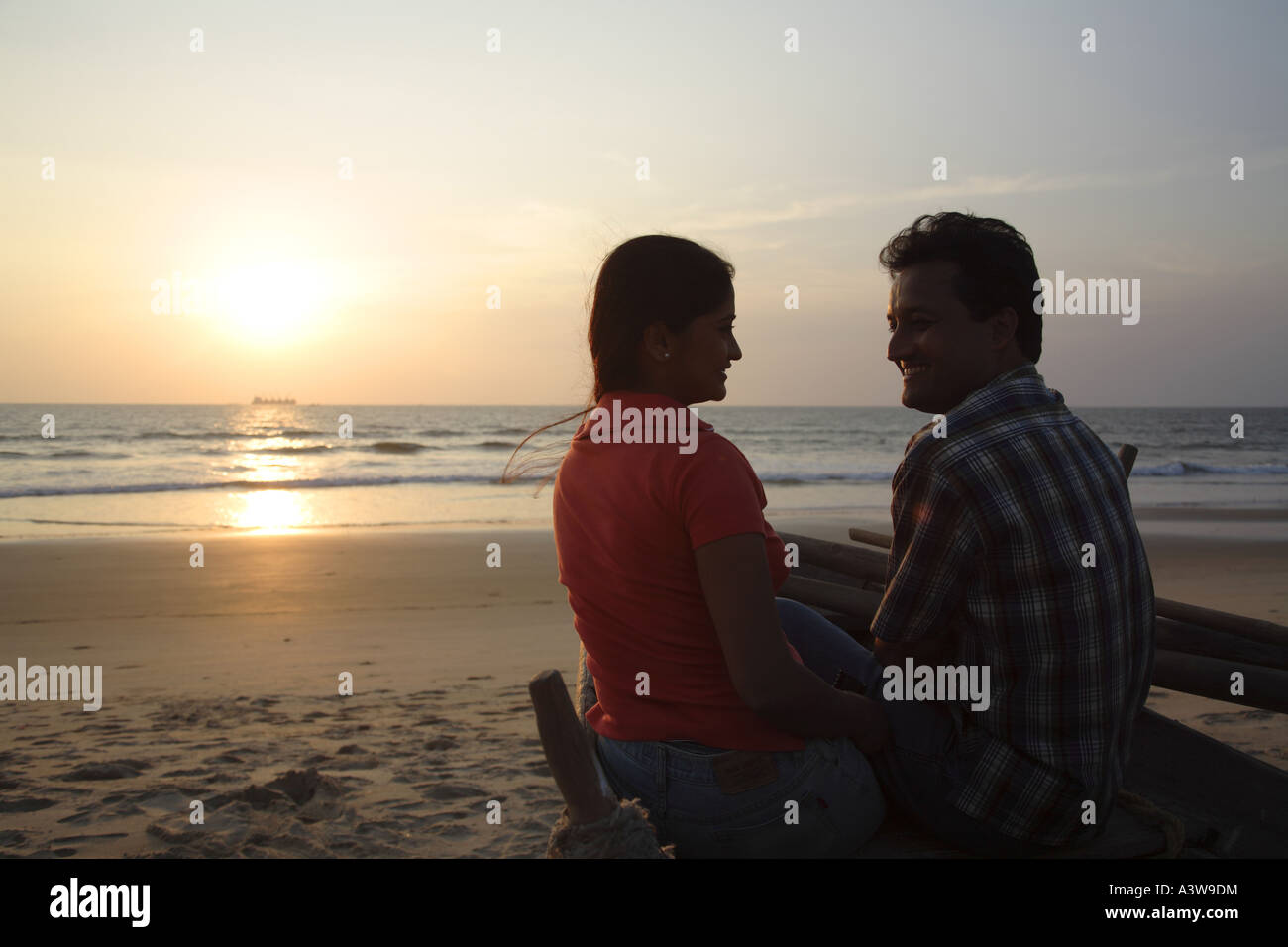 Couple on holiday enjoying on beach sun sand sea Stock Photo