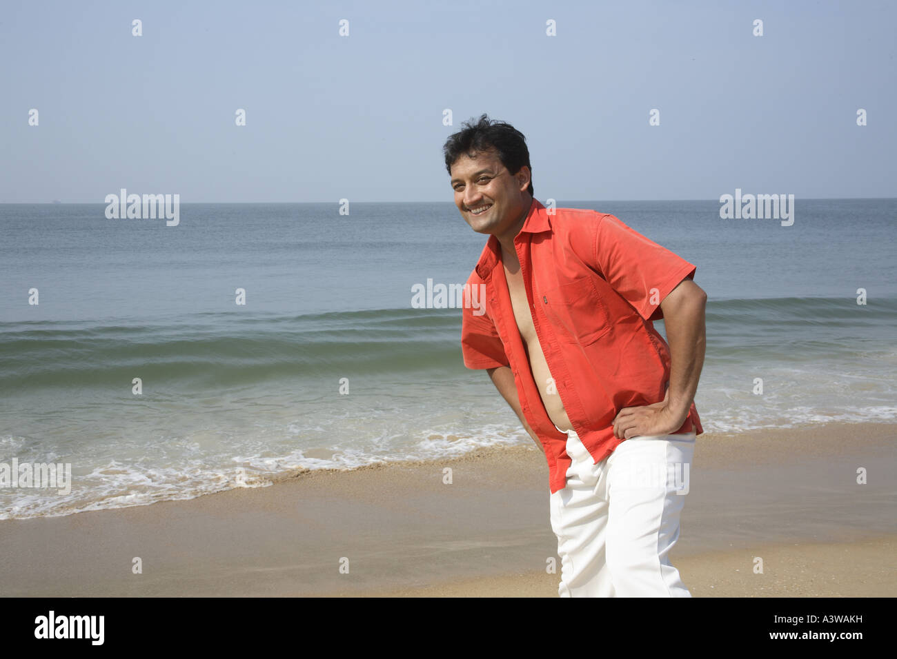 Indian man standing confidently hi-res stock photography and images - Alamy