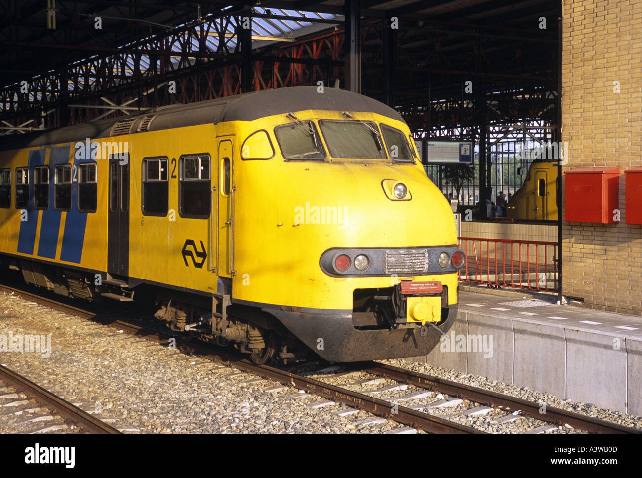 A Dutch Railways train in Eindhoven station in Amsterdam the Netherlands Stock Photo