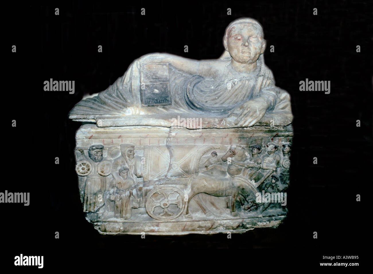 Etruscan funerary urn showing funeral waggon Museo Etrusco Guarnacci