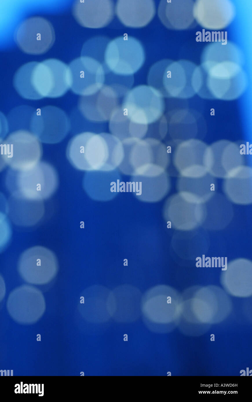 Office building lights defocused form a pattern of light and colour Stock Photo
