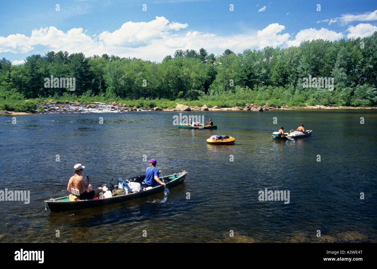 CANOEISTS FLOAT DOWN THE SACO RIVER NEAR FRYEBURG, N.E. NEW HAMPSHIRE