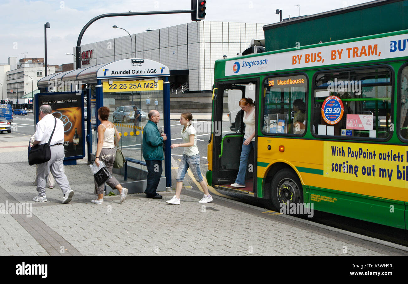 P Engers Getting Off A Bus In Sheffield City Centre England P Engers Getting Off A Bus In Sheffield City Centre England