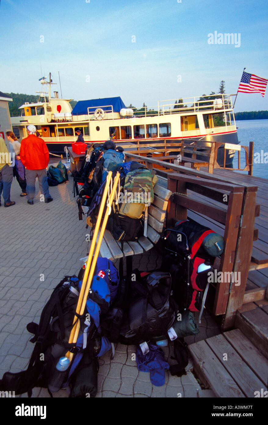 BACKPACKERS WAIT TO BOARD THE FERRY ISE ROYALE QUEEN III IN COPPER