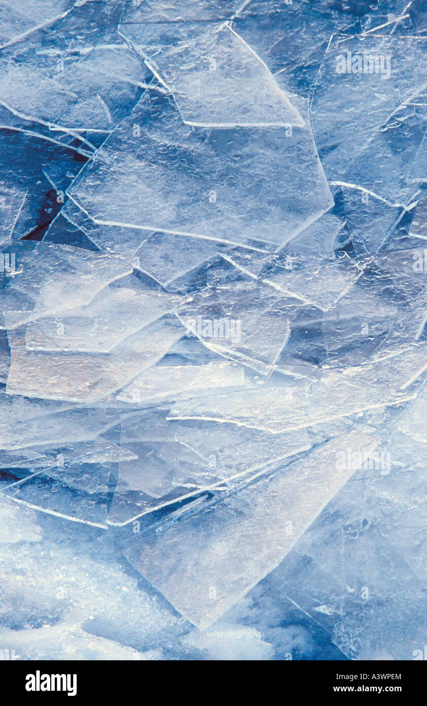 ICE SHARDS PILED ON A LAKE SUPERIOR SHORE IN MARQUETTE MICHIGAN Stock Photo