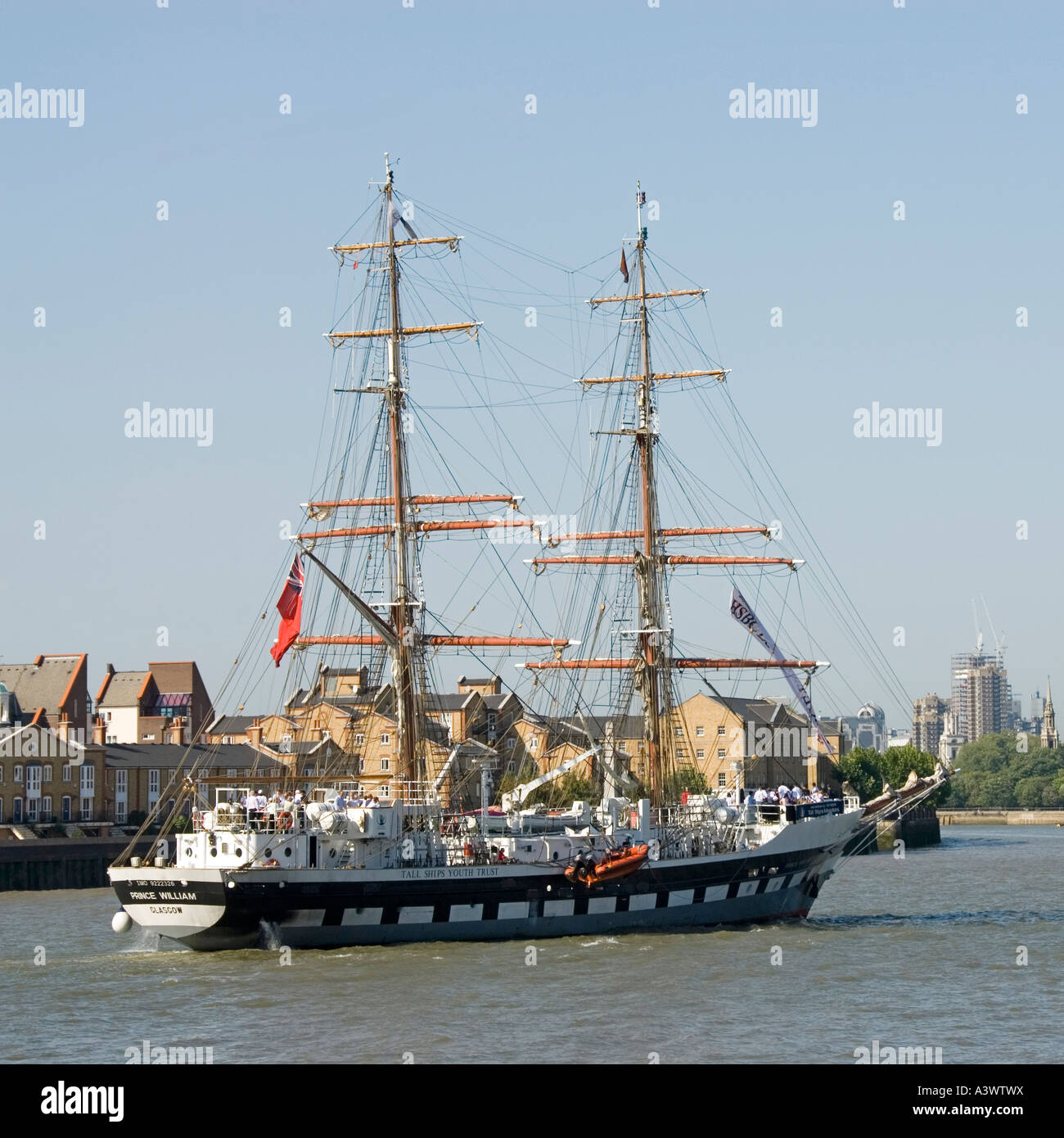 The Tall Ships Youth Trust Prince William registered in Glasgow sailing up the River Thames at Canary Wharf Stock Photo
