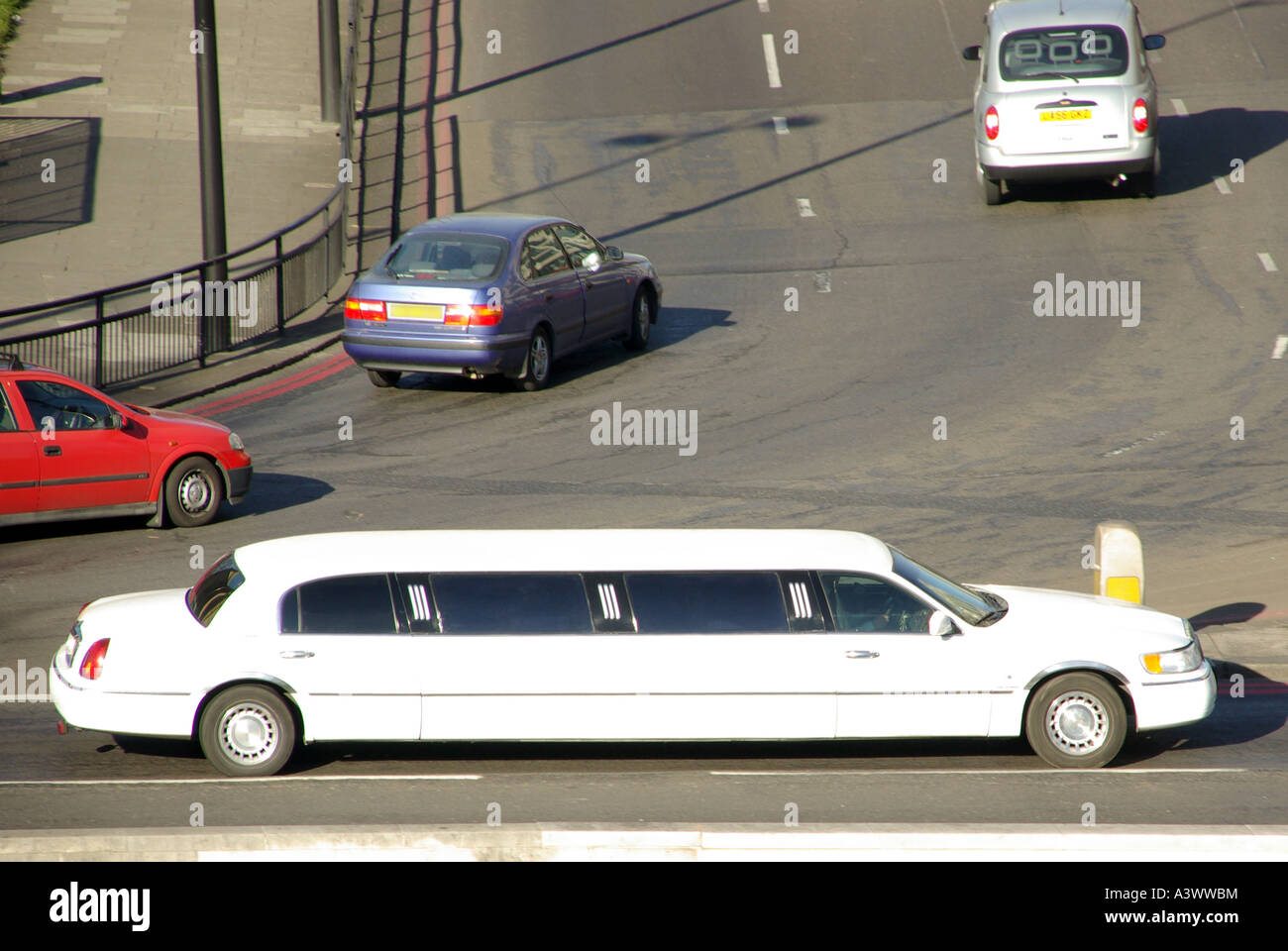 Stretch Limousine in traffic at Hyde Park Corner junction London Stock Photo