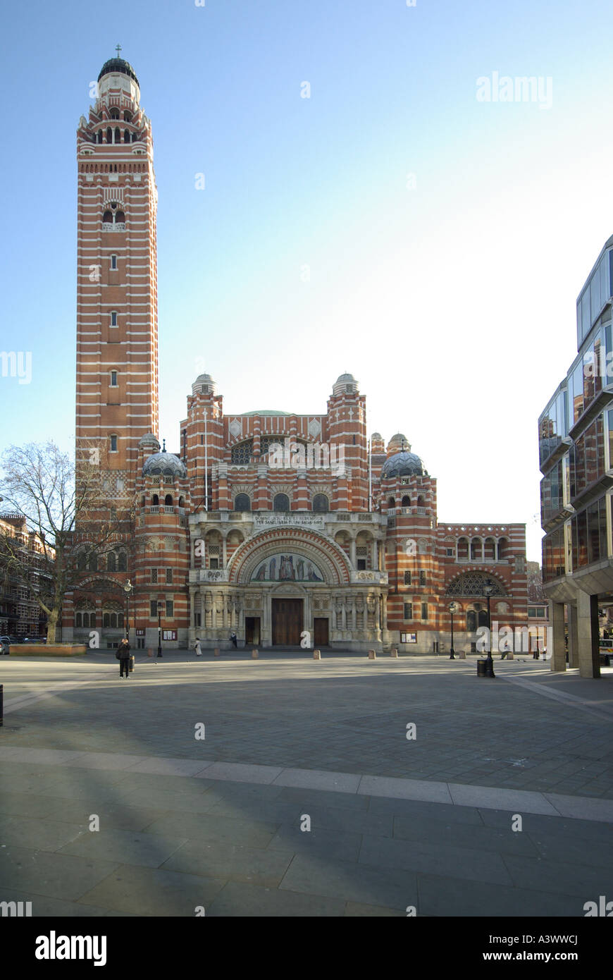 Neo Byzantine tower & main entrance to Roman Catholic religion Westminster Cathedral church built in striped brick & stone Victoria London England UK Stock Photo
