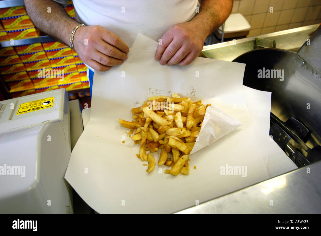 Portion of chips at fish and chip shop, England UK Stock Photo Alamy