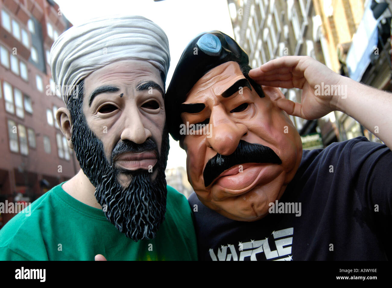 Men wearing masks of Osama Bin Laden and Saddam Hussein London England  Britain UK Stock Photo - Alamy