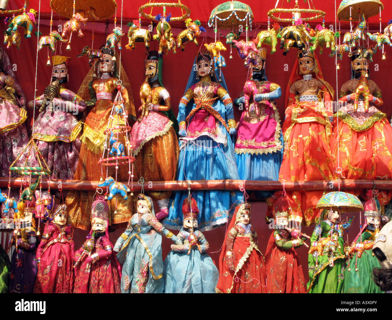 INDIA Puppets in traditional costumes for sale at a bazaar in Mumbai