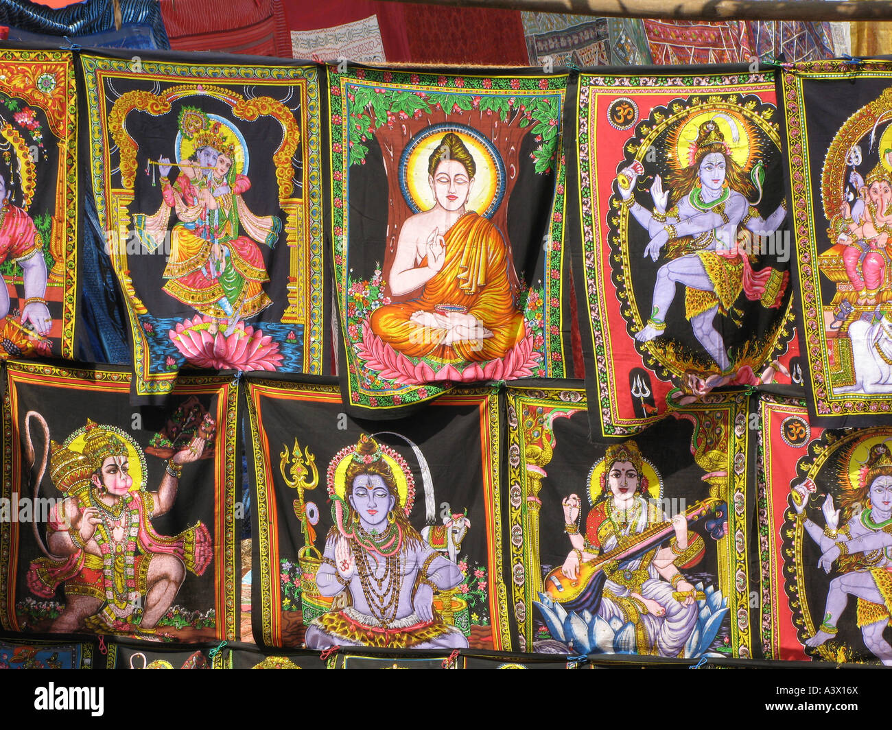 INDIA Garments with Hindu deities for sale in a Mumbai bazaar Photo Julio Etchart Stock Photo