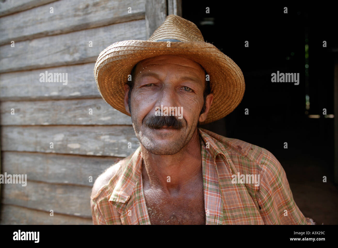 A tobacco farmer rests at his home in the Vinales valley, Pinar del Rio province, Cuba.West Indies. Stock Photo