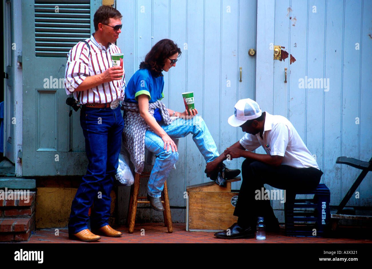 Cowboy boots get street shoe shine New Orleans Louisiana USA Stock Photo -  Alamy