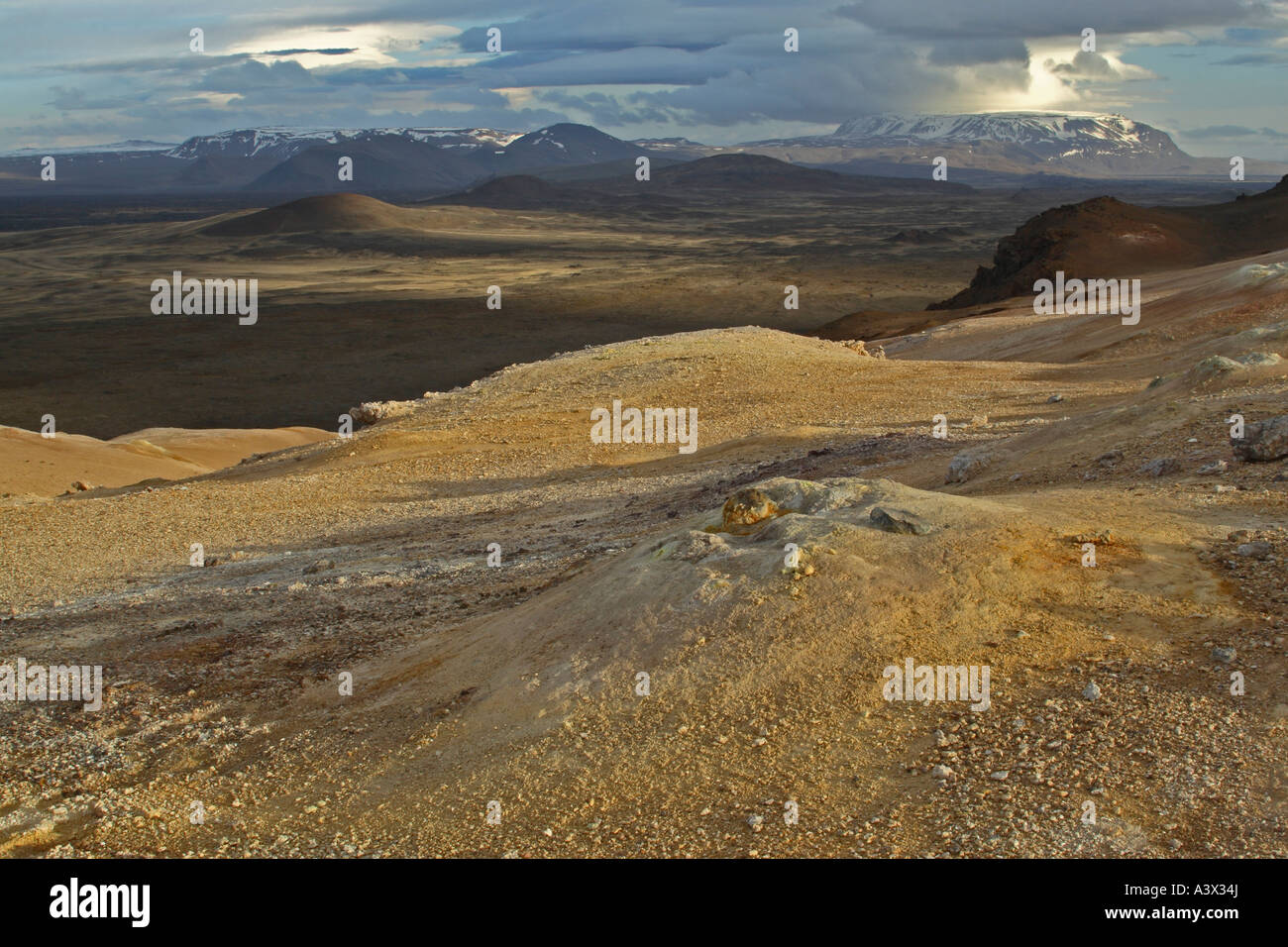 Geothermally active region near Myvatn in Iceland Sulphur rich rock formations and volcanically created hills and mountains Stock Photo