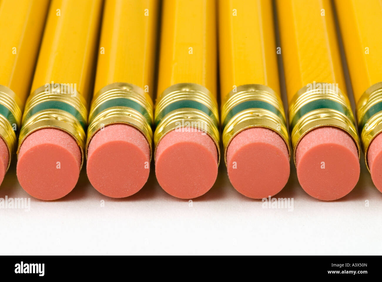 Pencil erasers in a row Stock Photo