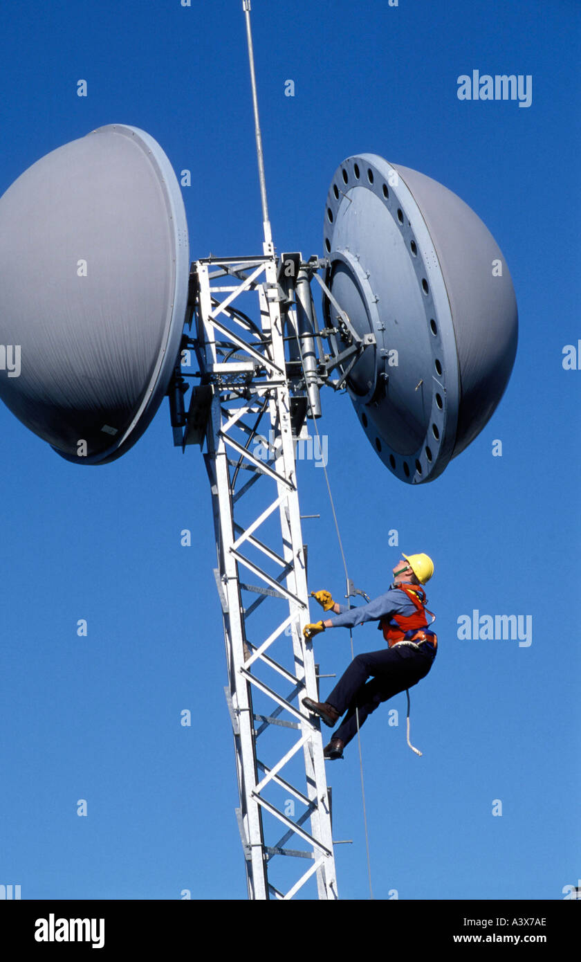 radio microwave link and linesman, photo by Bruce Miller Stock Photo