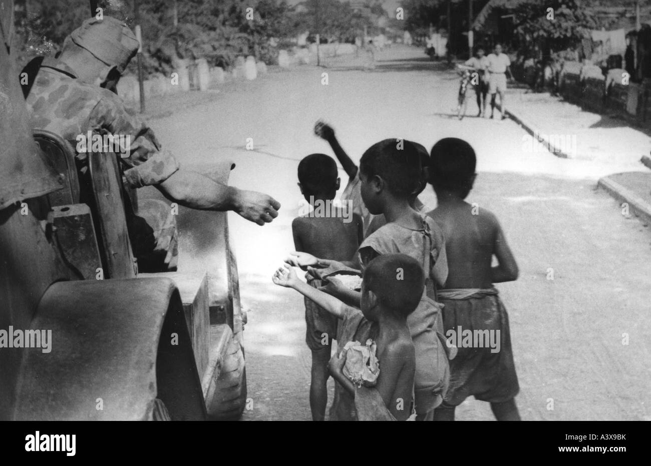 geography/travel, Indonesia, War of Independence 1947 - 1949, dutch troops are greeted by children, Cirebon, Java, 1947, Cheribon, occupation, Dutch East Indies, colonialism, military, Netherlands, Asia, 20th century, historic, historical, people, 1940s, Stock Photo