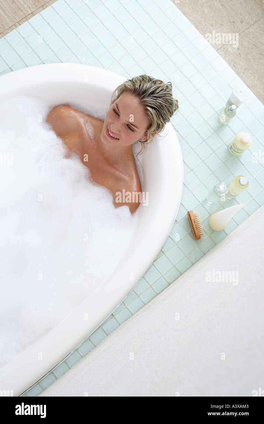 Woman soaking in bathtub hi-res stock photography and images - Alamy