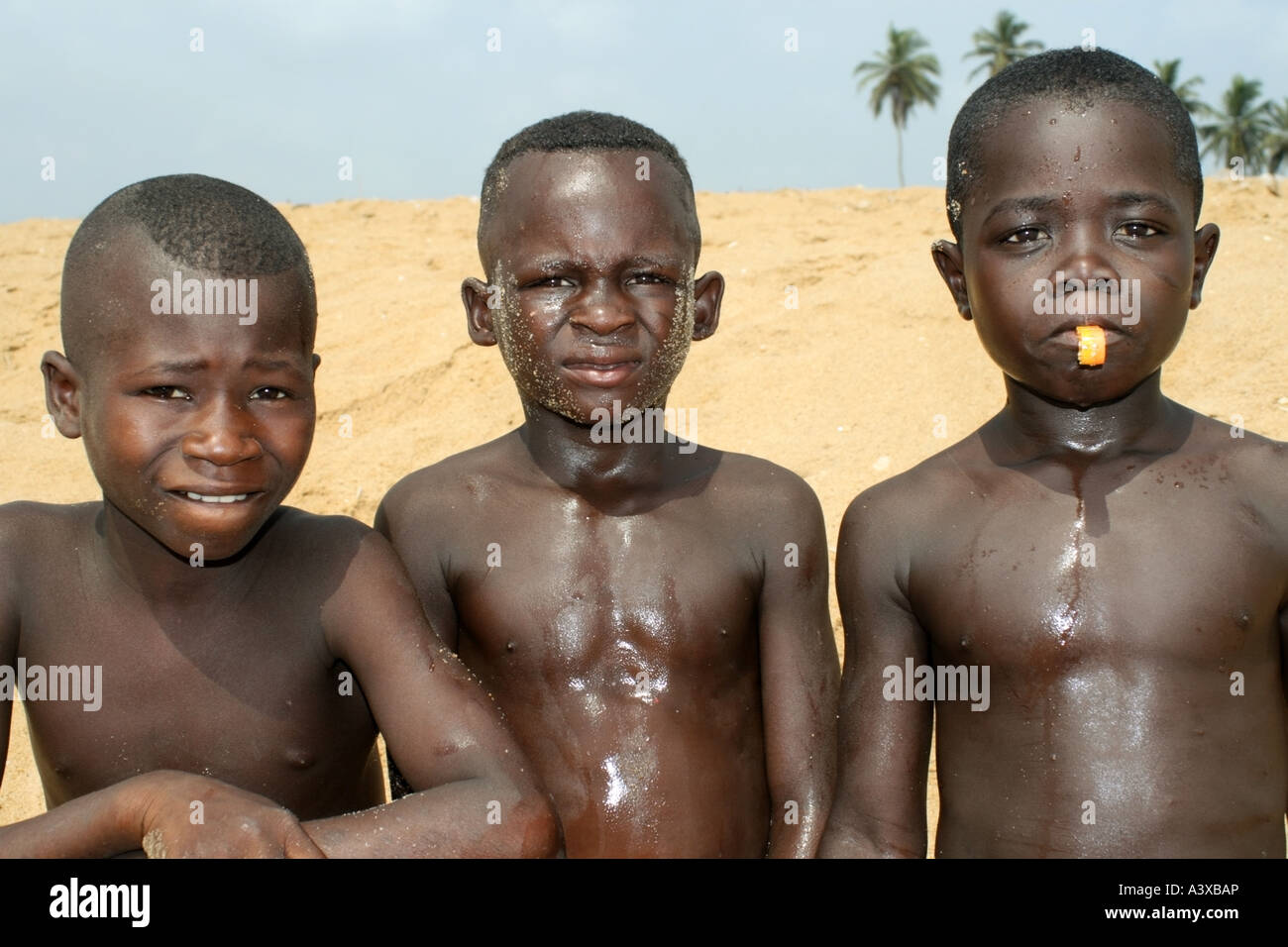 Three Benin boys at the beach , Grand Popo , Benin Stock Photo - Alamy
