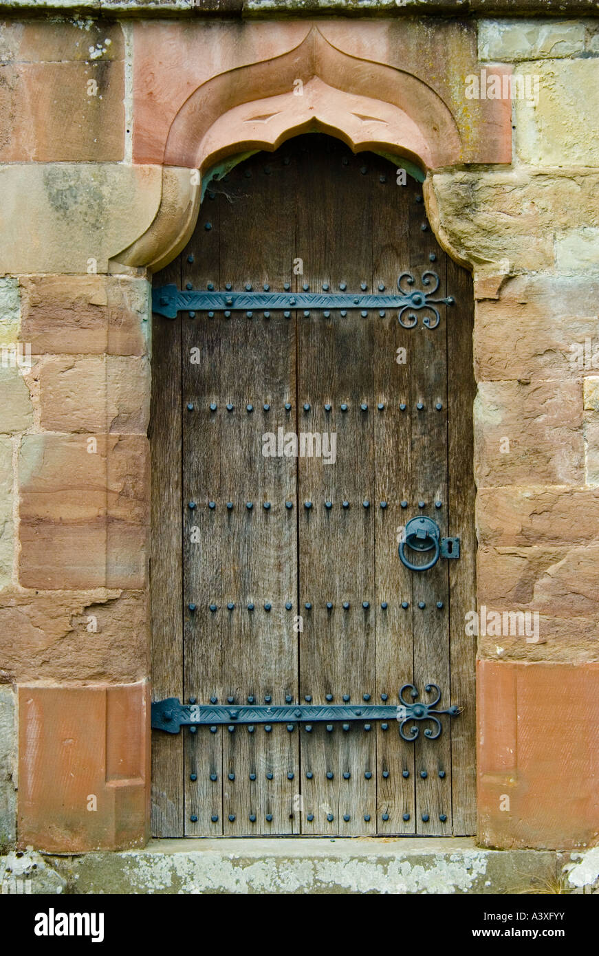 Old oak wooden studded door hi-res stock photography and images - Alamy