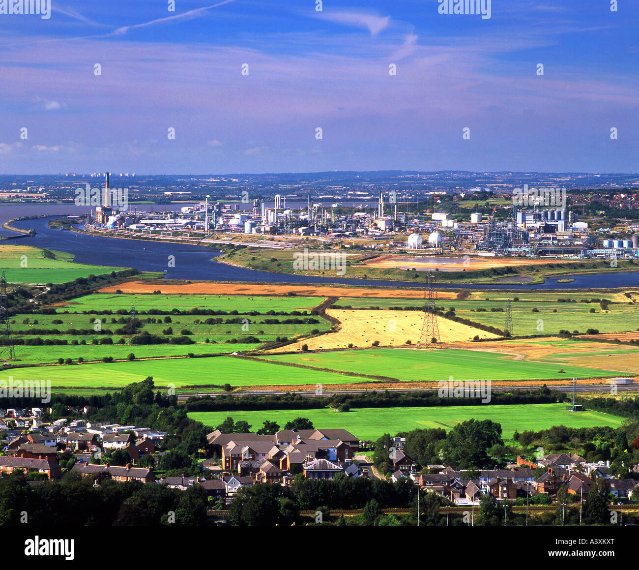 The Mersey Estuary, and Industrial Works Near Runcorn, Viewed From Frodsham Hill, Near Frodsham, Cheshire, England, UK Stock Photo