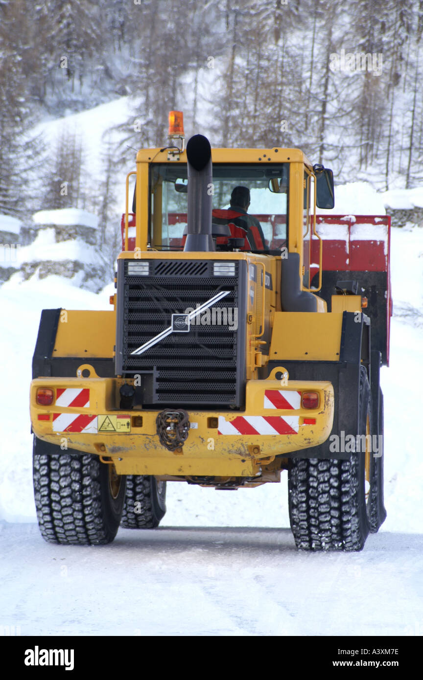 On the Volvo snow clearing in Val D'Isere Jan 2005 neige poudre Tarentaise Savoie France Stock Photo