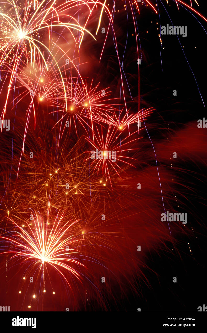 Many fireworks going off in the night sky Stock Photo Alamy