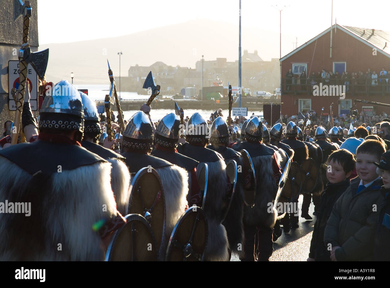 dh Up Helly Aa procession LERWICK SHETLAND Guizer Jarl Einar of Gullberuviks Viking sqaud parading crowds watching parade culture festival Stock Photo