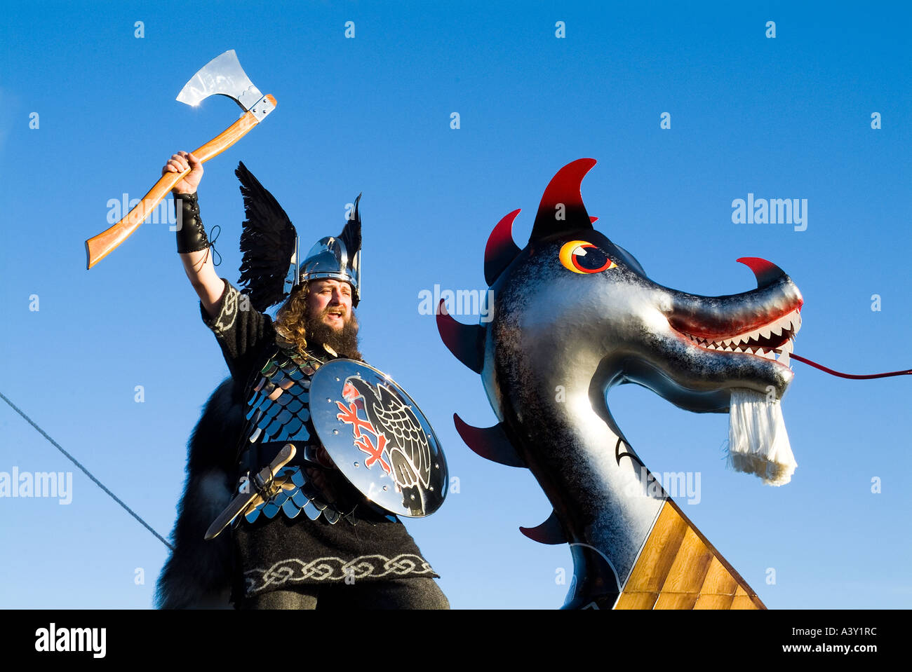 dh Up Helly Aa procession LERWICK SHETLAND Guizer Jarl Viking longship galley prow axe norse warrior ship historic longboat scotland Stock Photo