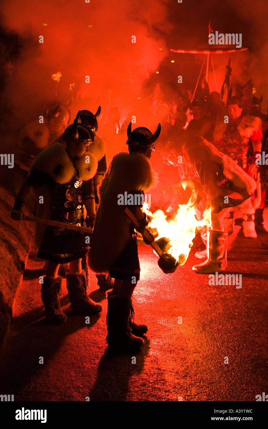 dh Up Helly Aa child vikings LERWICK SHETLAND Lighting up torches Junior fire procession Viking galley burning kids Stock Photo