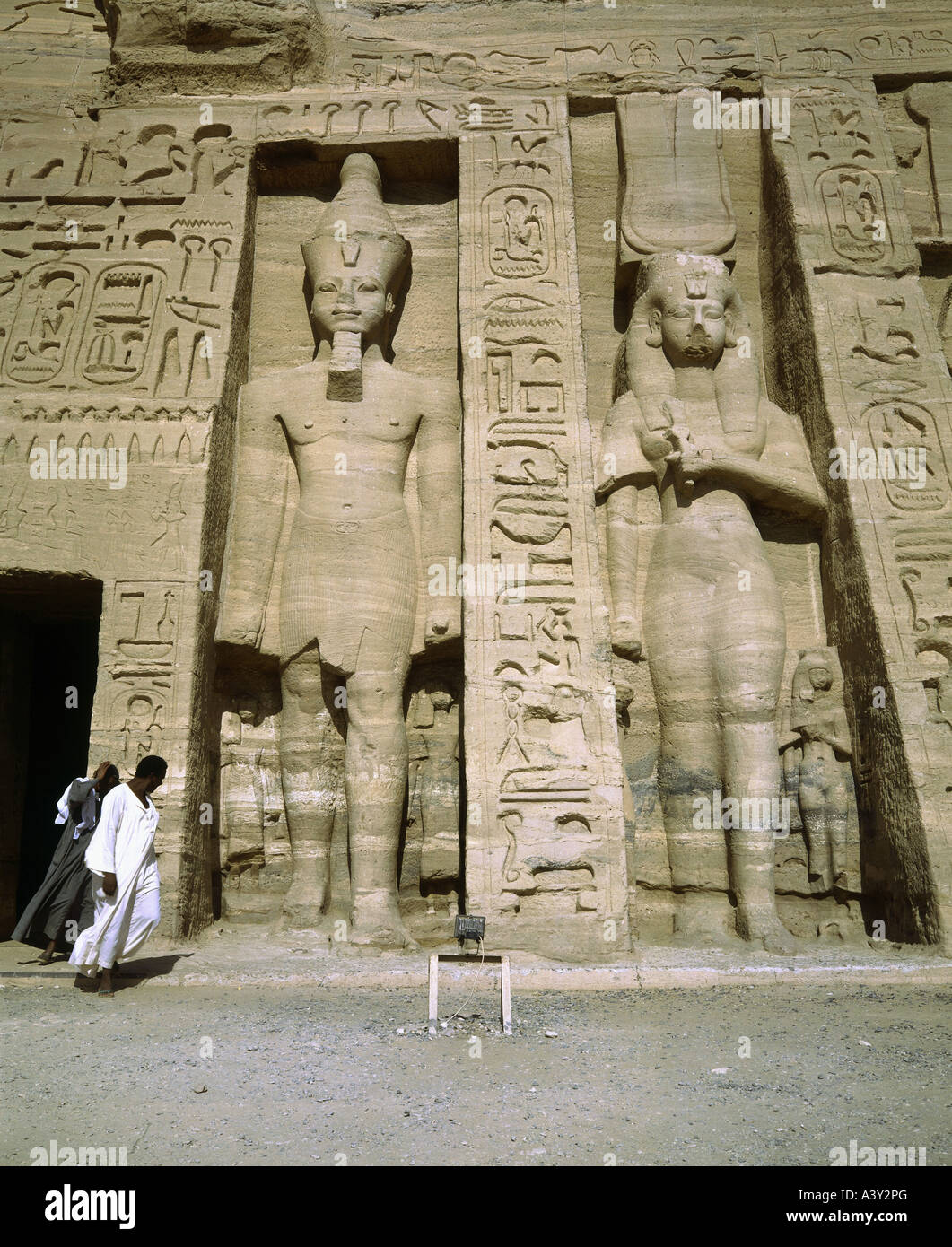 geography / travel, Egypt, Abu Simbel, buildings, smaller Hathor temple of Ramesses II, exterior view, facade, detail, statue of pharaoh and wife Nefertari, standing, built 13th century BC, , Stock Photo