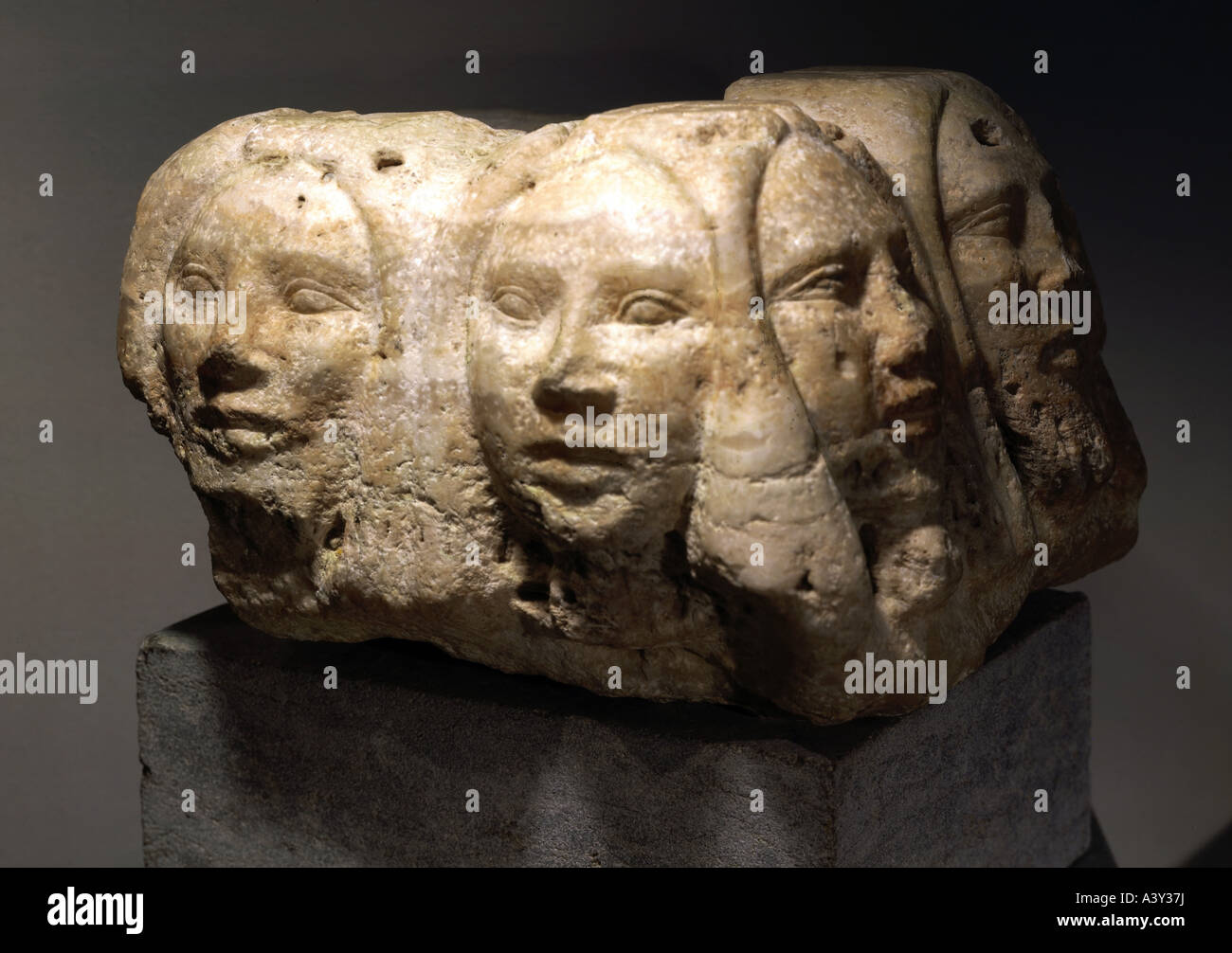fine arts, ancient world, Egypt, Old Kingdom, sculpture, statue base with four faces, calcite, circa 2800 BC, state collection o Stock Photo