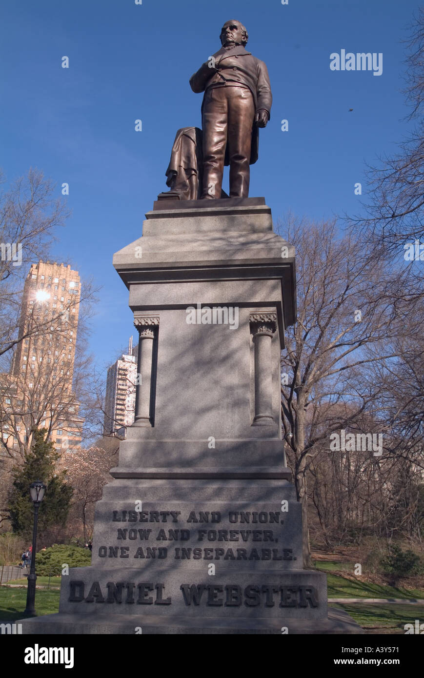New York Central Park statue monument with surrounding buildings Stock