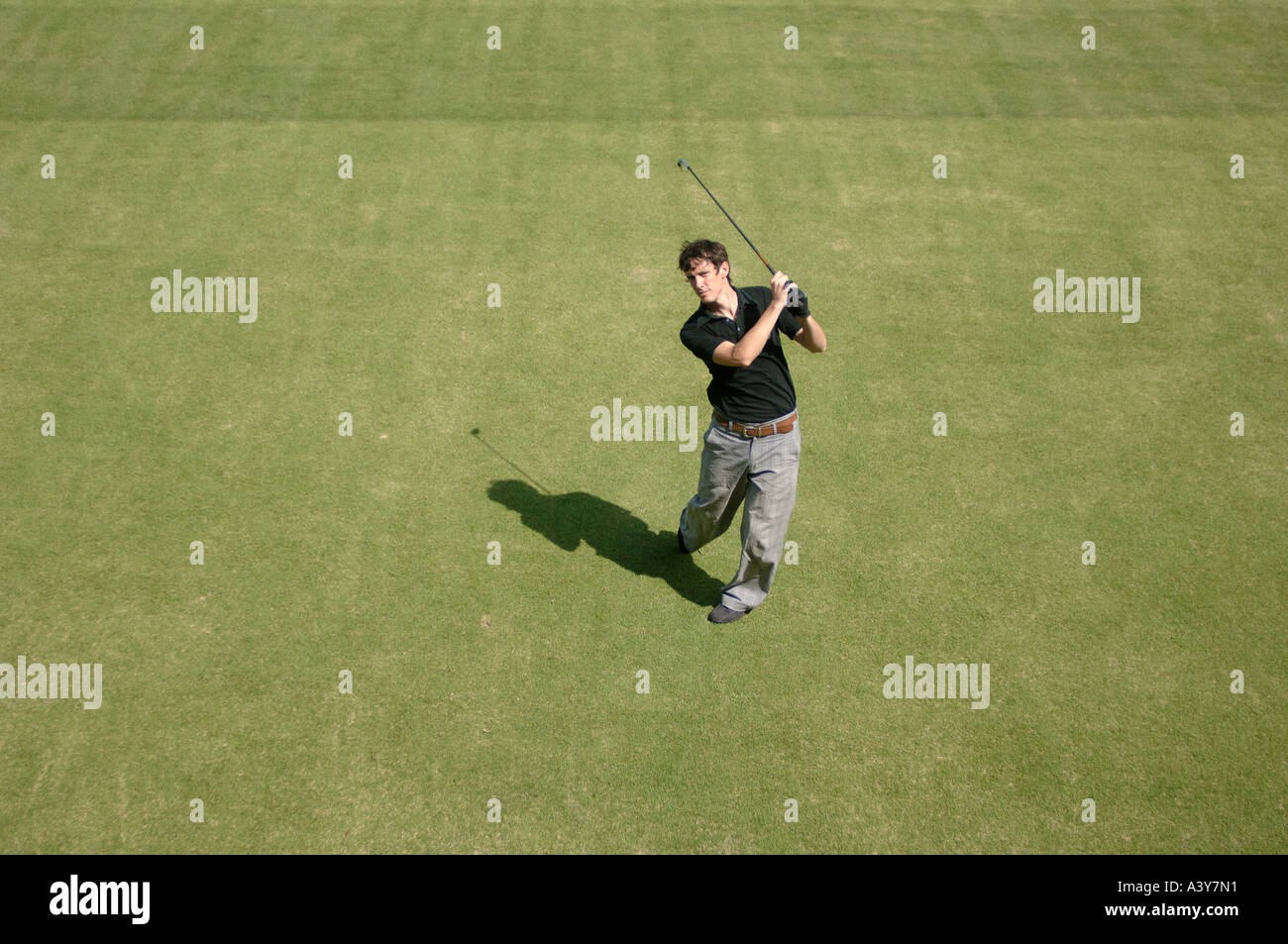 High angle view of a man playing a golf stroke Stock Photo