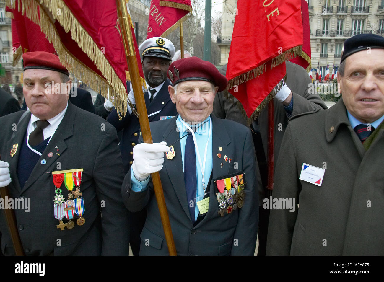 Veterans stand at official commemoration of France s North African wars December 2003 Stock Photo