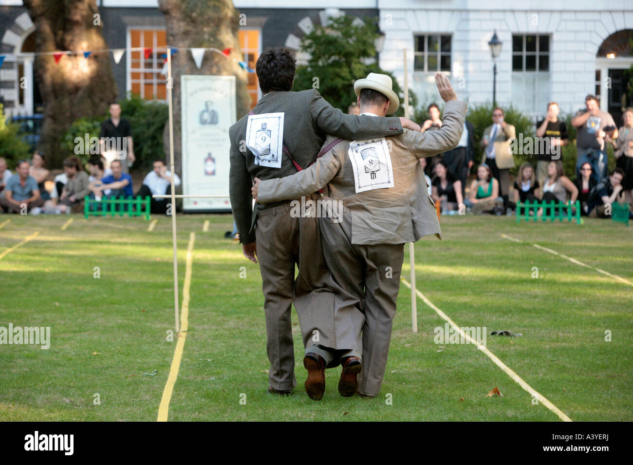 Chaps Racing The three legged race at the Chaps Olympics in London Stock Photo - Alamy