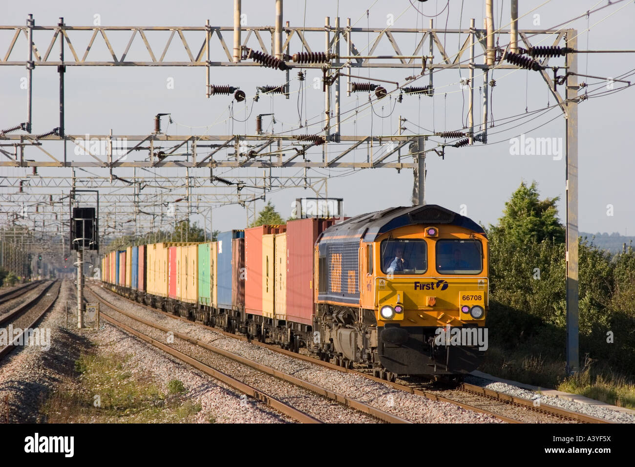 GBRf class 66 diesel locomotive No 66708 with an intermodal freight train at Cheddington in Buckinghamshire. Stock Photo