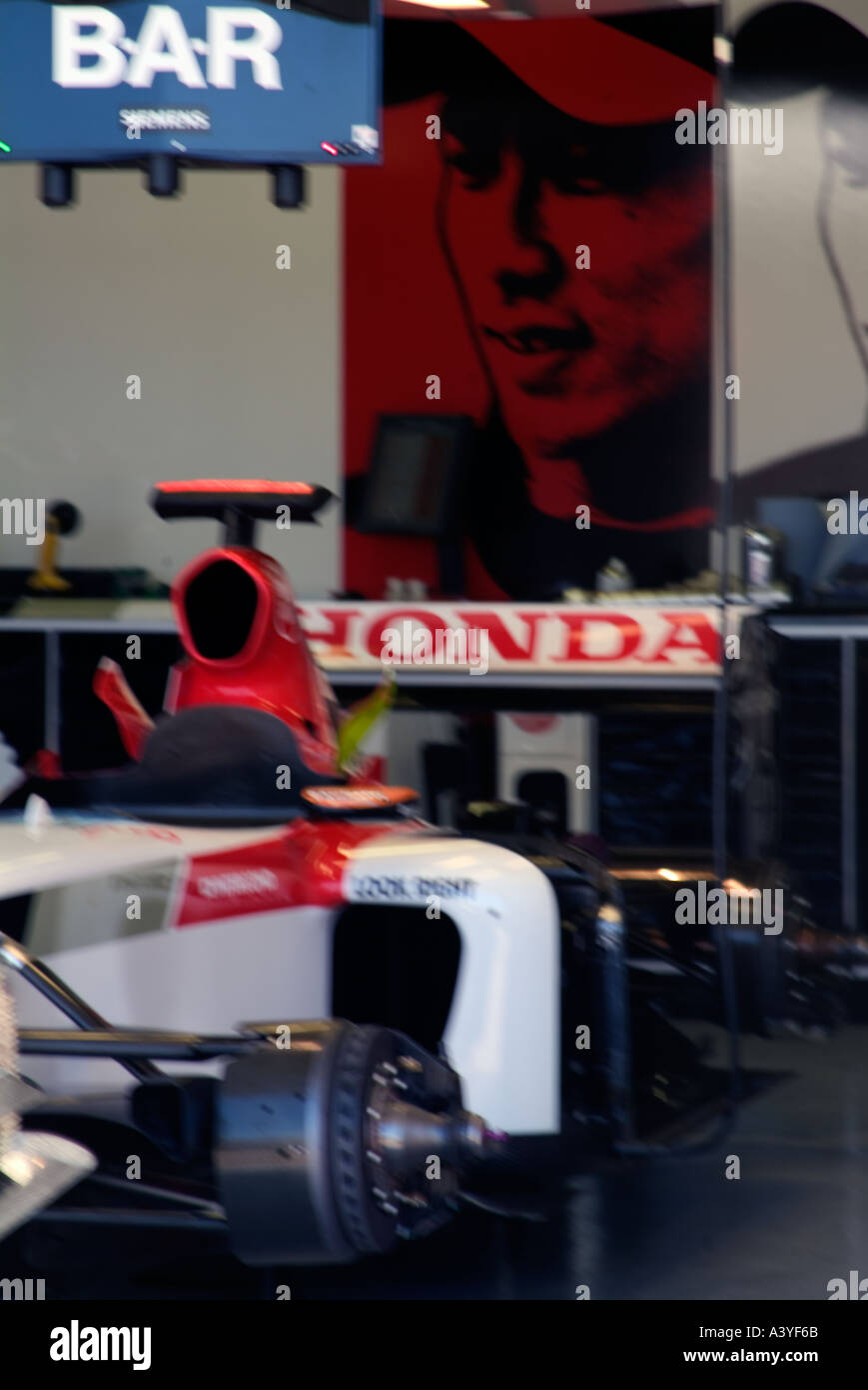 Formula 1 racing car pit lane front garages honda bar portrait Gilles