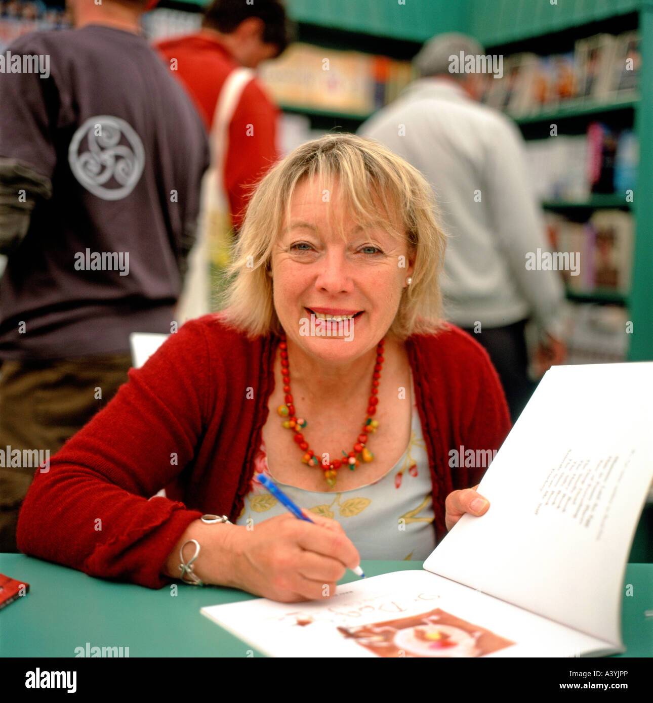 Childrens writer Babette Cole author of Mummy Laid An Egg! & kids books  book signing in bookshop at the Hay Festival, Hay-on-Wye, UK  KATHY DEWITT Stock Photo