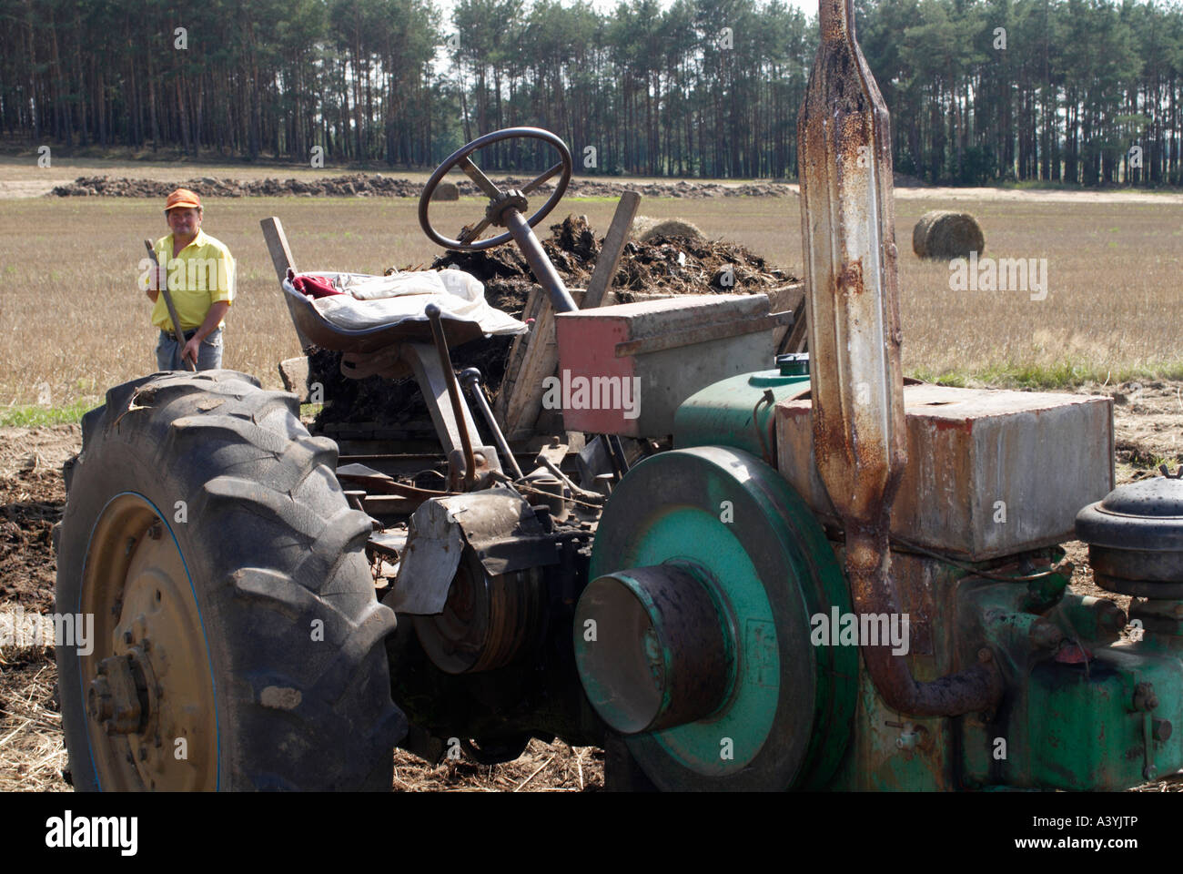 A farmer on a traditional farm in Poland Stock Photo Alamy