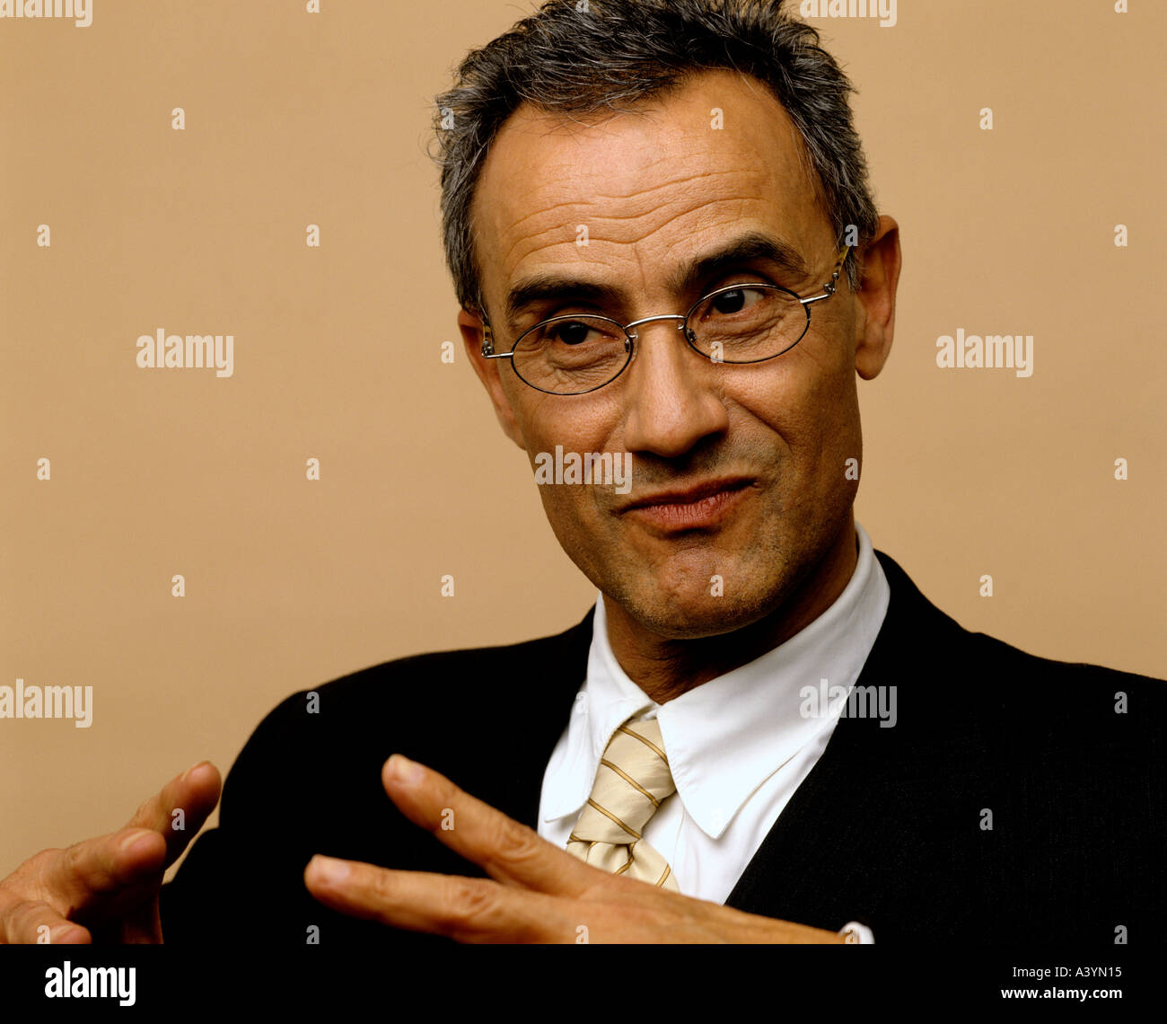 portrait of mature businessman wearing suit and tie Stock Photo - Alamy